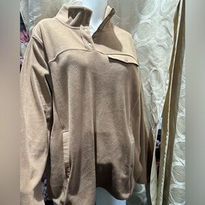 32• heat beige soft fluffy sweater with snap buttons and pockets